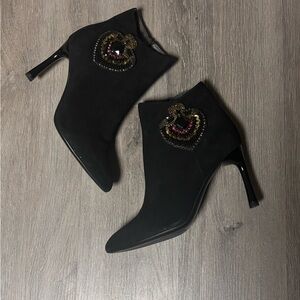 Chic Black Heeled Boots with Embellished Design